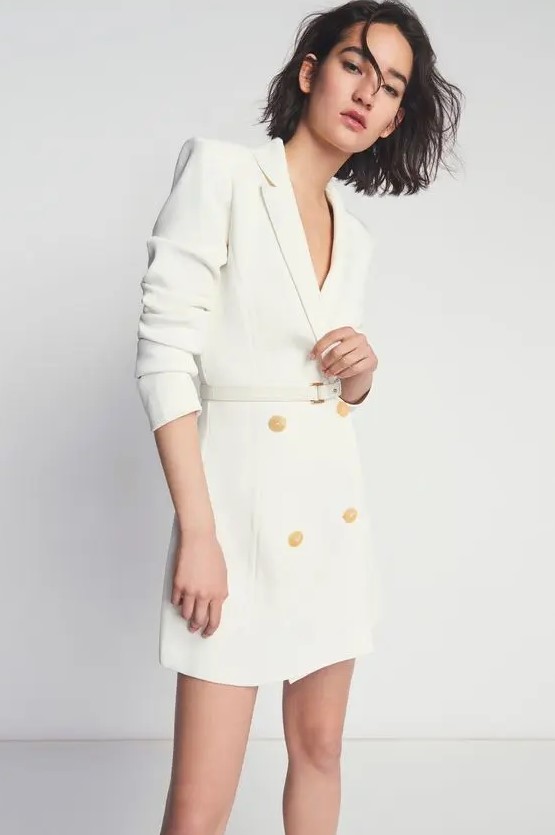 a white blazer as a mini wedding dress with gold buttons and a belt is a lovely idea for a city hall wedding