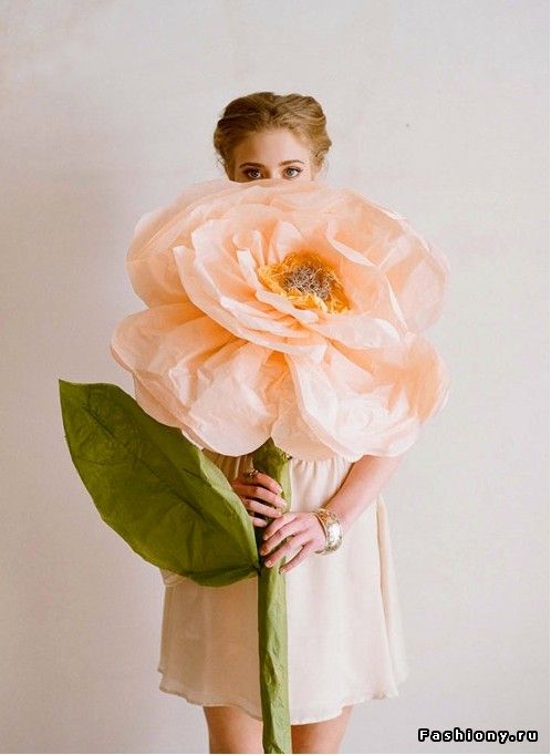 an oversized peachy bloom of paper is a fun and cool piece that can be used to style your wedding