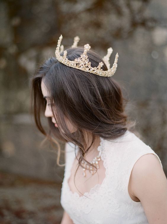 a bold and large gold and crystal bridal crown will make your look princess or queen-like