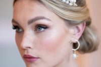 a breathtaking pearl and rhinestone star bridal crown will make your bridal look ultimately beautiful and fantastic