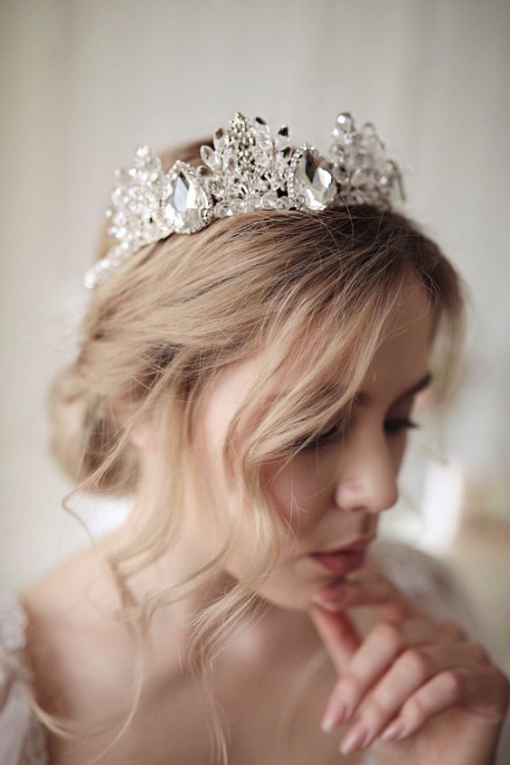 a fantastic large rhinestone and crystal bridal crown will make a super bold and glam statement in your look