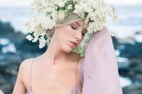 a fantastic oversized white floral crown is a beautiful and unusual idea for a spring bride, especially paired with a colored wedding dress