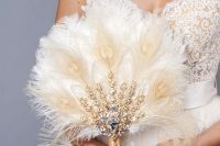 a feather fan wedding bouquet with heavy embellishments is a very chic and glam idea for a bride who loves vintage