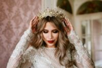 a gold embellished bridal crown with spikes for a more glam look just wows