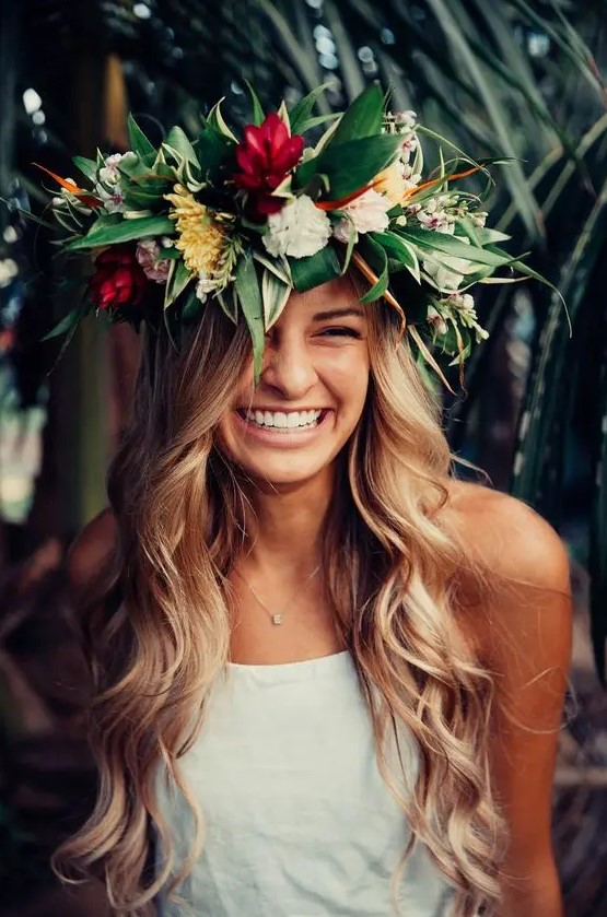 a large tropical floral crown with red, yellow and white blooms plus textural leaves for a bold look