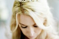 a lovely intricate gold crown with crystals will finihs off your beautiful and exquisite bridal look