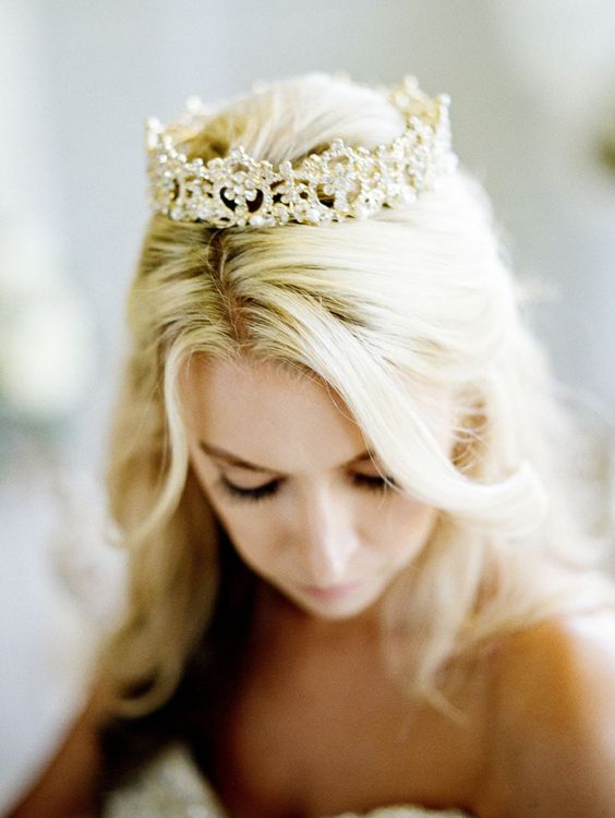 a lovely intricate gold crown with crystals will finihs off your beautiful and exquisite bridal look