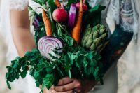 a vegan wedding bouquet of radish, carrots, onions, artichokes, greenery is a fun and cool idea for a farmhouse bride