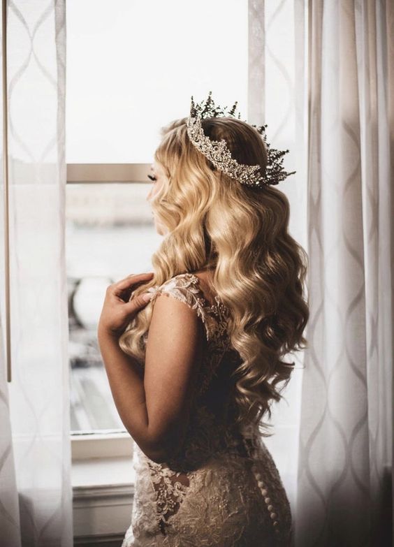 an embellished full bridal crown is a fabulous accessory and addition to any royal-inspired bridal look