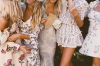 bridesmaids dressed up into floral dresses, cute hats and floral crowns look great at a vintage bridal shower