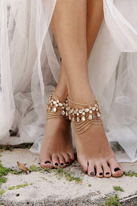 gorgeous multi tiered gold chain anklets with large rhinestones are amazing for a boho bride, wherever you are celebrating your wedding