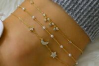 layered gold chain anklets with little pearls, stars and half moons and small rhinestones are amazing for a bridal look