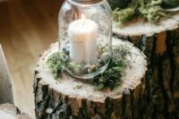 a cozy wedding decor idea with tree stumps