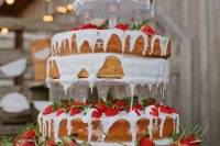 naked wedding cakes with creamy drip and fresh strawberries are amazing for a summer wedding