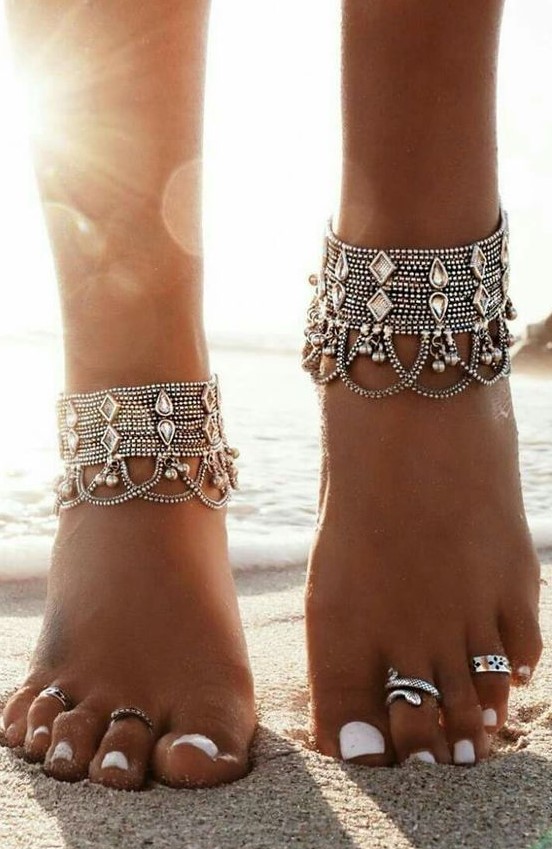 statement multi layered bead row anklets with large rhinestones, additional chains and small bells plus toe rings