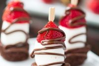 strawberry and brownie kabobs with chocolate sauce and marshmallows are delicious and very crowd-pleasing sweets for any wedding