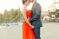 a fantastic orange ombre strapless wedding dress with a draped bodice and a pleated skirt is a gorgeous idea for a beach wedding