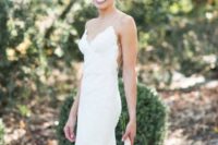 a lace sheath vineyard wedding dress on spaghetti straps with a cutout back is a chic and refined idea