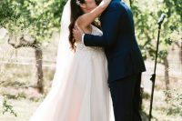a vineyard wedding ceremony in the vines is a cool idea – you don’t have to make a backdrop or a vineyard arch if you have vines
