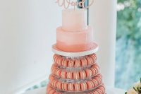 a wedding cake tower with macarons