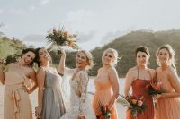 mellow yellow, rust, grey mismatching maxi bridesmaid dresses are great for a boho beach wedding in tropics