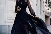 a beautiful maxi black dress with a partly sheer skirt and a cutout on the neckline is a gorgeous solution for a bride-to-be or bridal shower guests