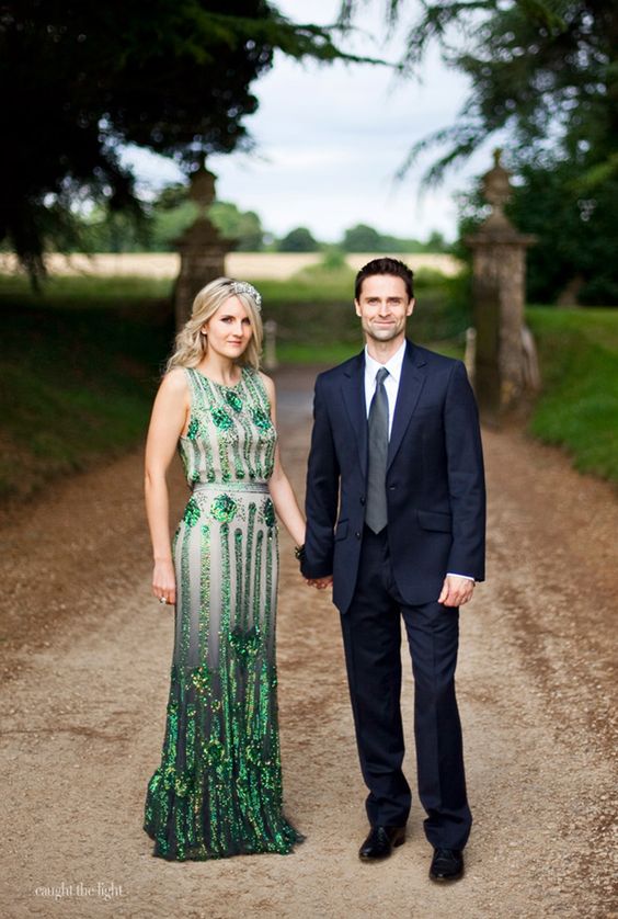 a glam art deco wedding dress in emerald, all shiny and sparkly for a chic and bright bride