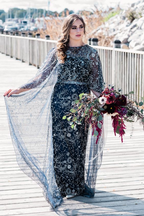 a navy galaxy wedding dress with embellishments and embroidery for a celestial bride wows at once