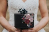 a cute small moody wedding cake