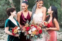 beautiful mismatching emerald, purple and coral velvet maxi bridesmaid dresses are ultimate for a bright fall wedding