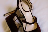 burgundy velvet strappy shoes with high heels are a very beautiful and deep-toned idea for a modern Halloween bridal look with a refined touch