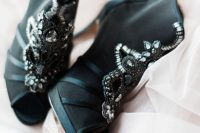 gorgeous black peep toe booties with embellishments by Badgley Mischka for a glam Halloween wedding