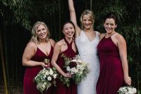 mismatching plum-colored maxi high low bridesmaid dresses are gorgeous for a fall wedding with plenty of color
