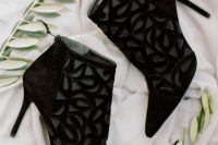 stunning laser cut black velvet wedding booties will be a chic statement for a modern Halloween wedding