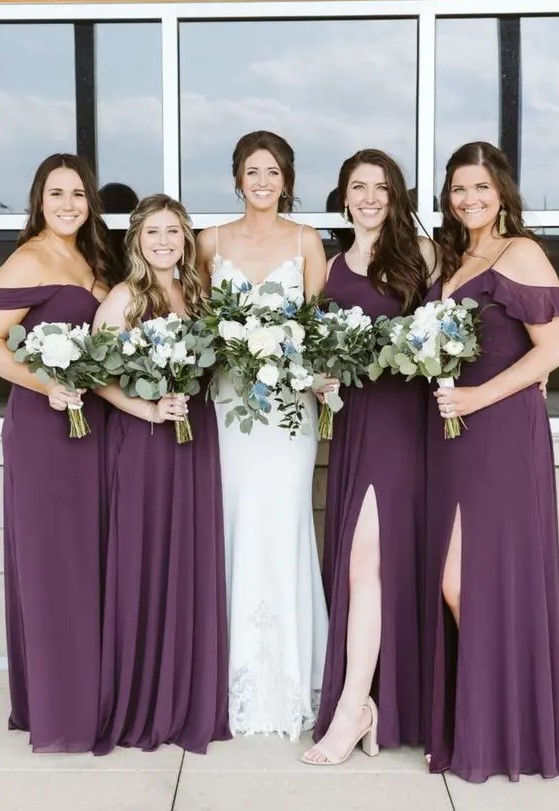stylish deep purple maxi bridesmaid dresses with mismatching necklines and slits plus nude shoes are a gorgeous combo for a wedding