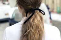 textured ponytails have been a big trend in wedding hair, just add a ribbon for a trendier look