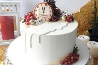 a NYE wedding cake in white, with white chocolate drip, gilded berries, a mini fit tree and an edible clock is very whimsy