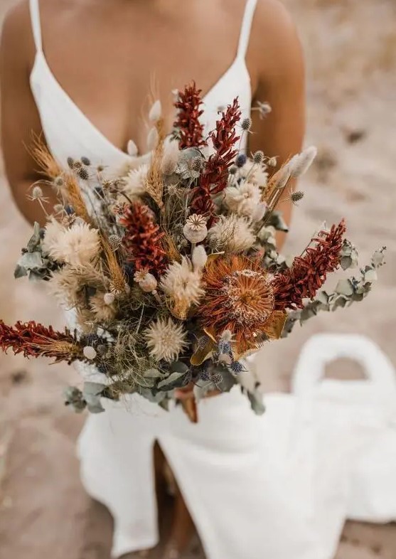 a dried boho wedding bouquet of all dried elements is a lovely idea for a spring woodland bride