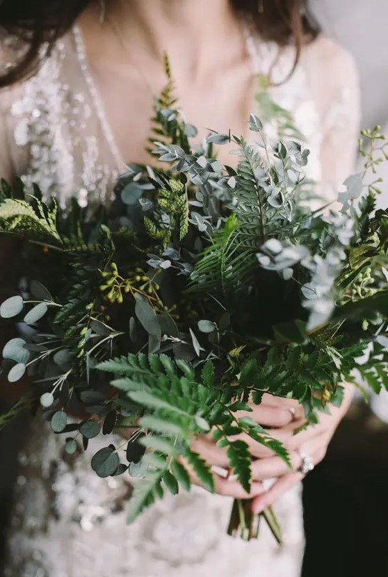a fern and eucalyptus wedding bouquet is a lovely and textural idea that will match a minimalist bridal look easily