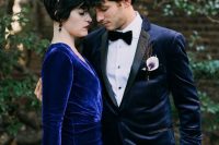 a groom’s look with a midnight blue velvet tux with black lapels, a bride wearing an electric blue velvet wedding dress