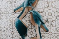 a pair of chic blue velvet wedding shoes with peep toes and ankle straps is a gorgeous solution for a wedding