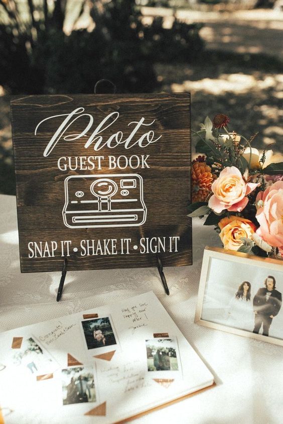 a photo wedding guest book with snaps is a very creative and cool idea for a wedding in any season