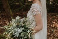 a textural forest greenery wedding bouquet with ferns, grasses, pale greenery and succulents is a fresh idea