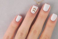 a white manicure with gold leaf chevrons are a timeless and stylish idea to rock for a glam wedding