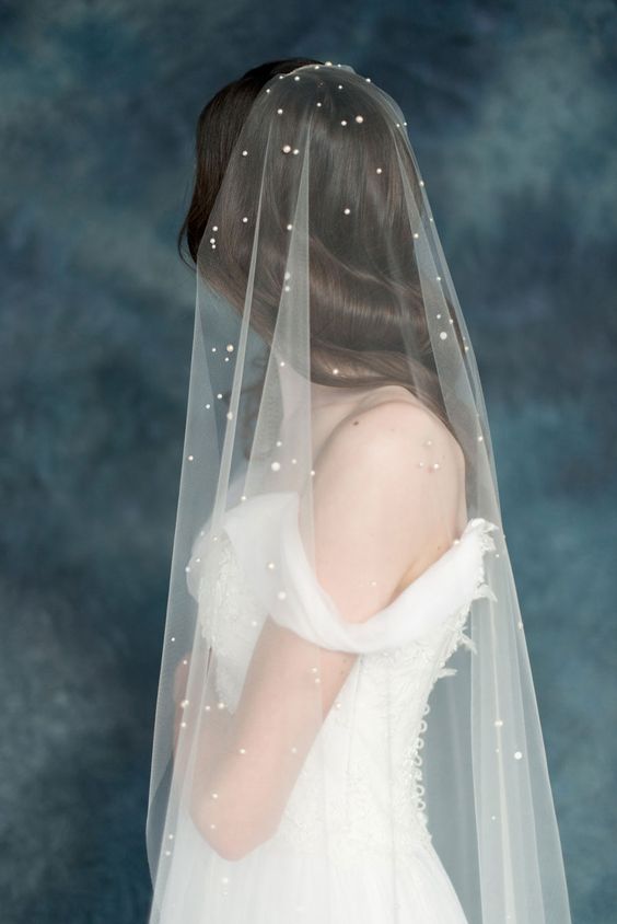an ethereal pearly veil will make your bridal look chic, romantic and very airy