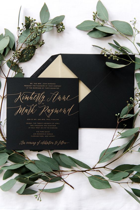 black and gold wedding invitation suite with calligraphy is a very elegant option