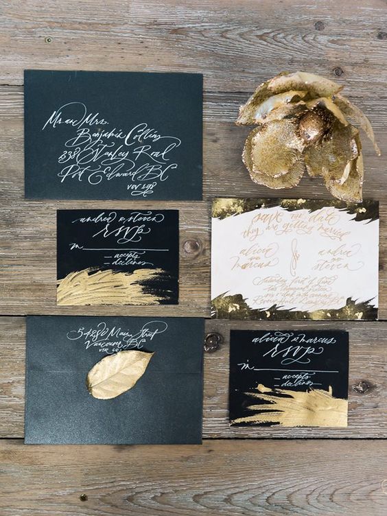 black and white wedding stationery with touches of gold is very chic