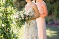 blush strapless maxi dresses for the bridesmaids and a neutral floral maxi dress for the maid of honor