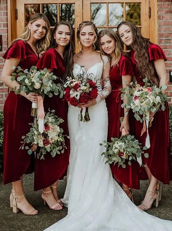 burgundy velvet wrap midi dresses with ruffle sleeves and V-necklines are gorgeous for a bright fall wedding