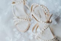 catchy and super glam strappy wedding shoes covered with pearls look very chic and adorable